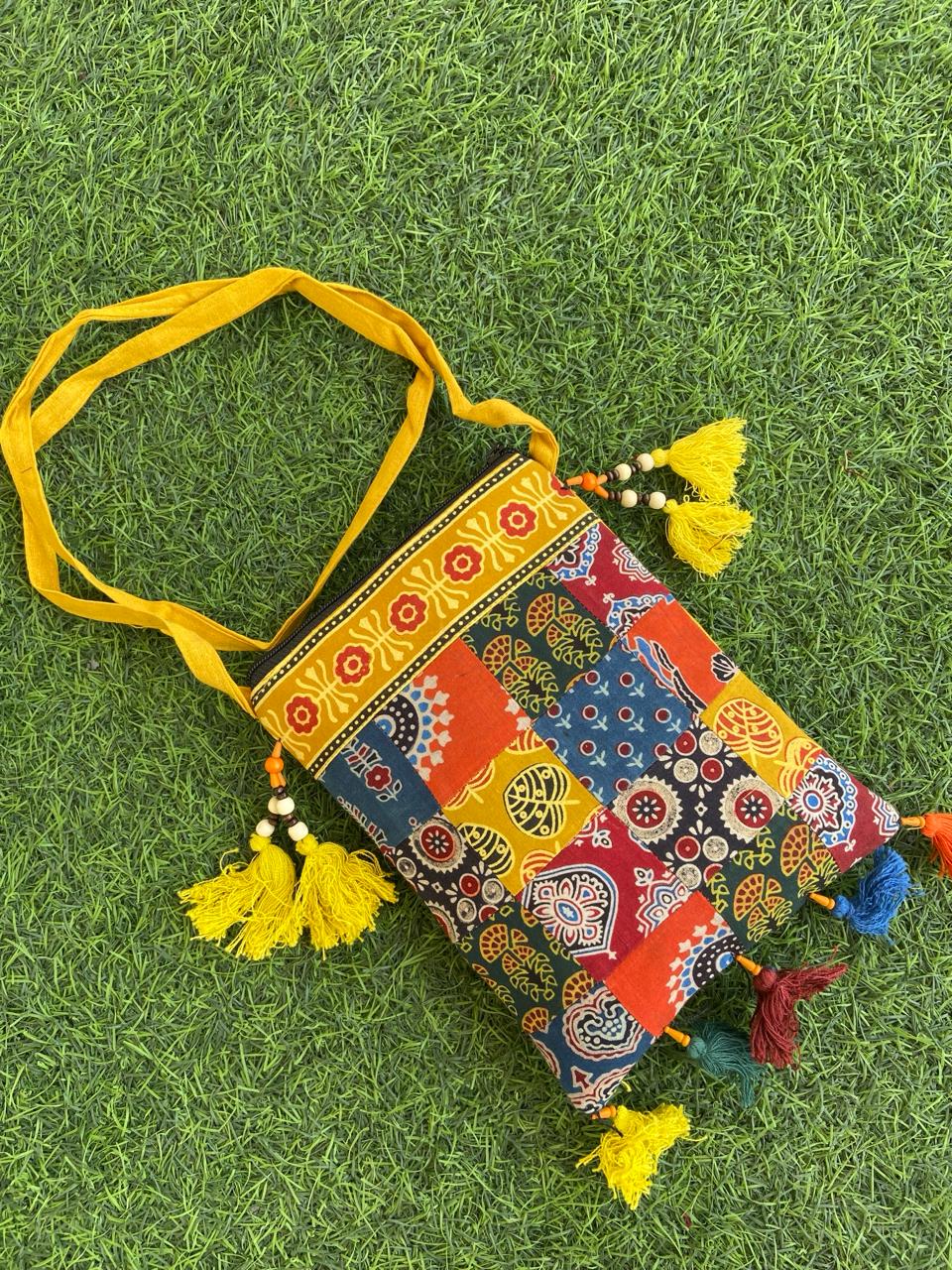 PATCHWORK SLING BAG-LAVNI SLING BAG