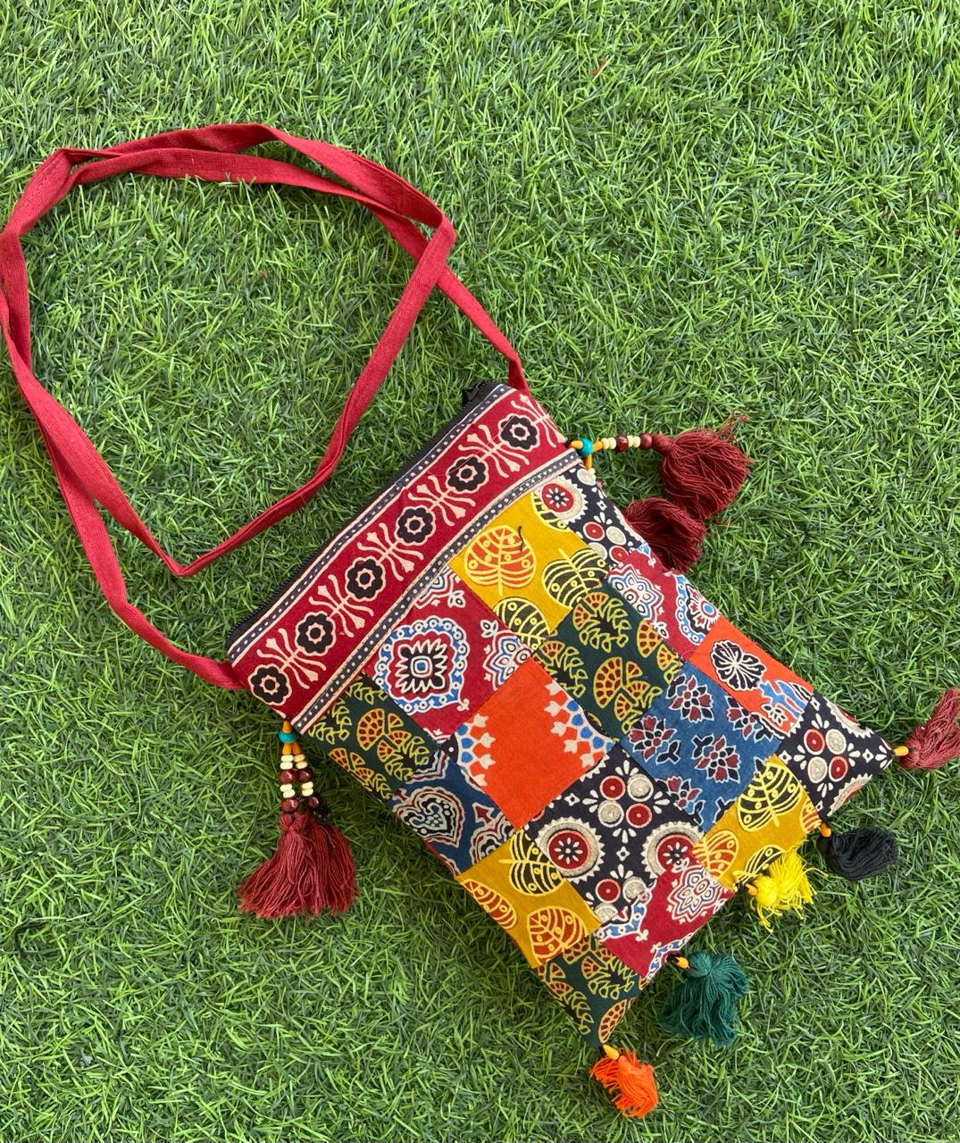 PATCHWORK SLING BAG-LAVNI SLING BAG