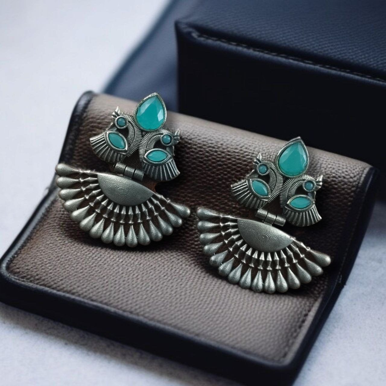 SILVER LOOK ALIKE EARRINGS WITH COLOURED STONES -NISHIKA