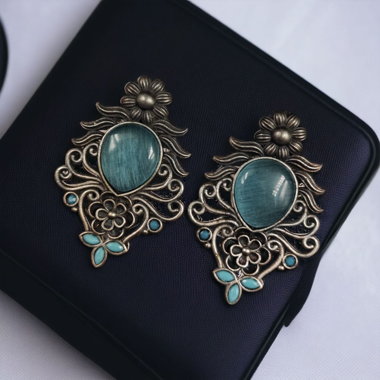 SILVER LOOK ALIKE EARRINGS WITH COLOURED STONES -ZIYA